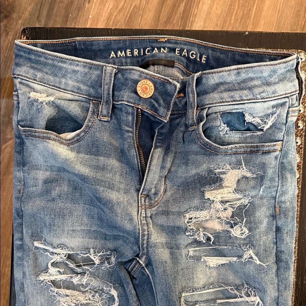 American Eagle Outfitters High Rise Distressed Light Blue Jeans